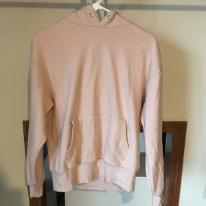 light pink sweatshirt